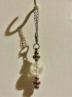 Cracked Iridescent Crystal Globe Keychain with Red Rhinestone Accent Detailing